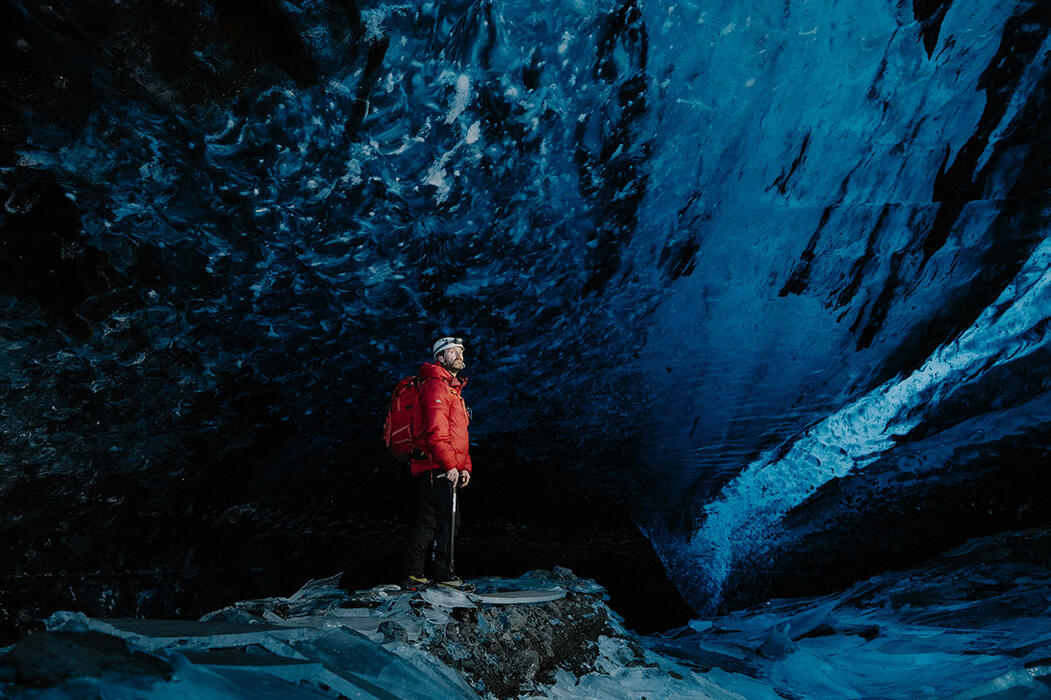 Man standing in an ice cave