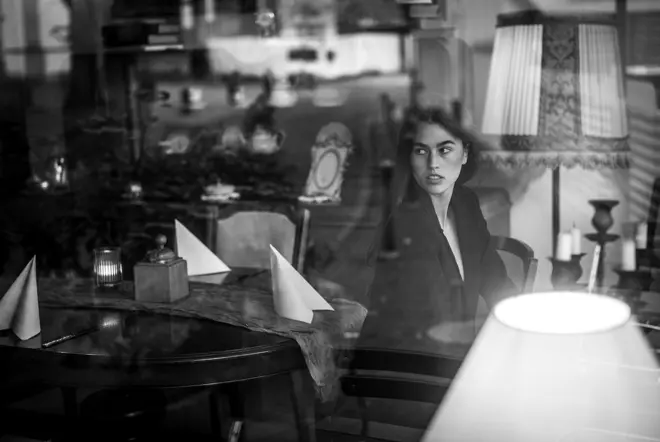 Model sitting in a cafe