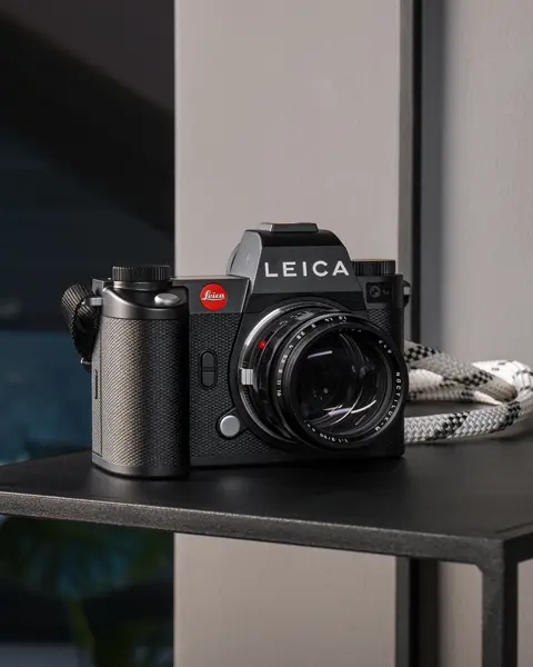 Black Leica Camera on a Table