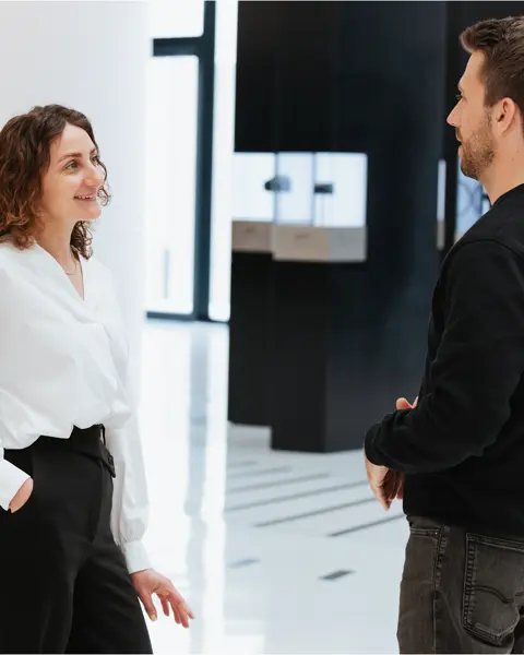Two Leica employees