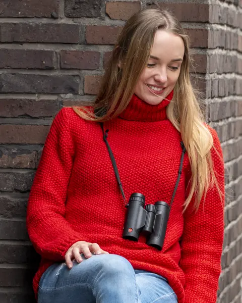 Woman with Trinovid HD around her neck
