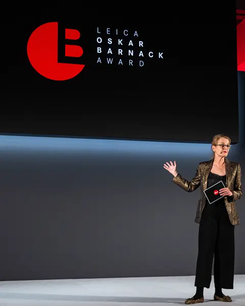 Karin Rehn-Kaufmann on stage of the Leica Oskar Barnack Award.
