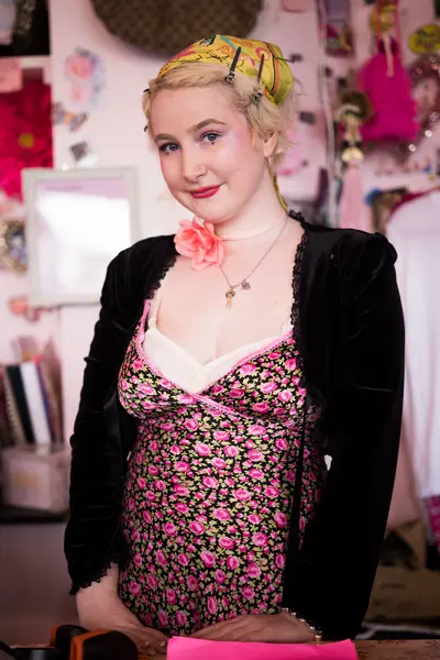 woman in pink with blond hair