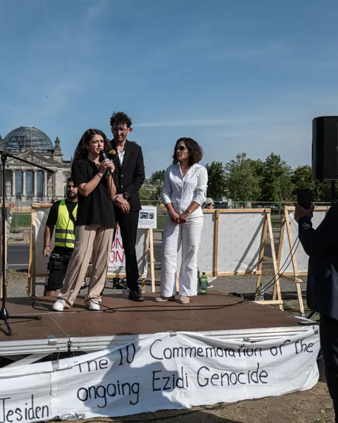 Girl on outside stage