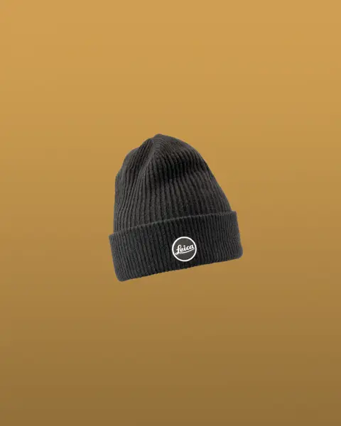 Black hat with Leica logo in front.