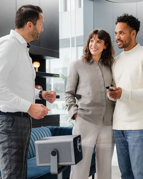 Couple receiving consultation on Cine Play 1 at Leica Store