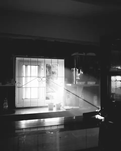 Black and white photo off a kitchen by Bet Bettencourt using the Q3 Monochrom