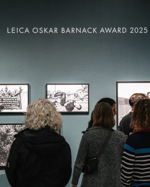 People at a Leica exhibition