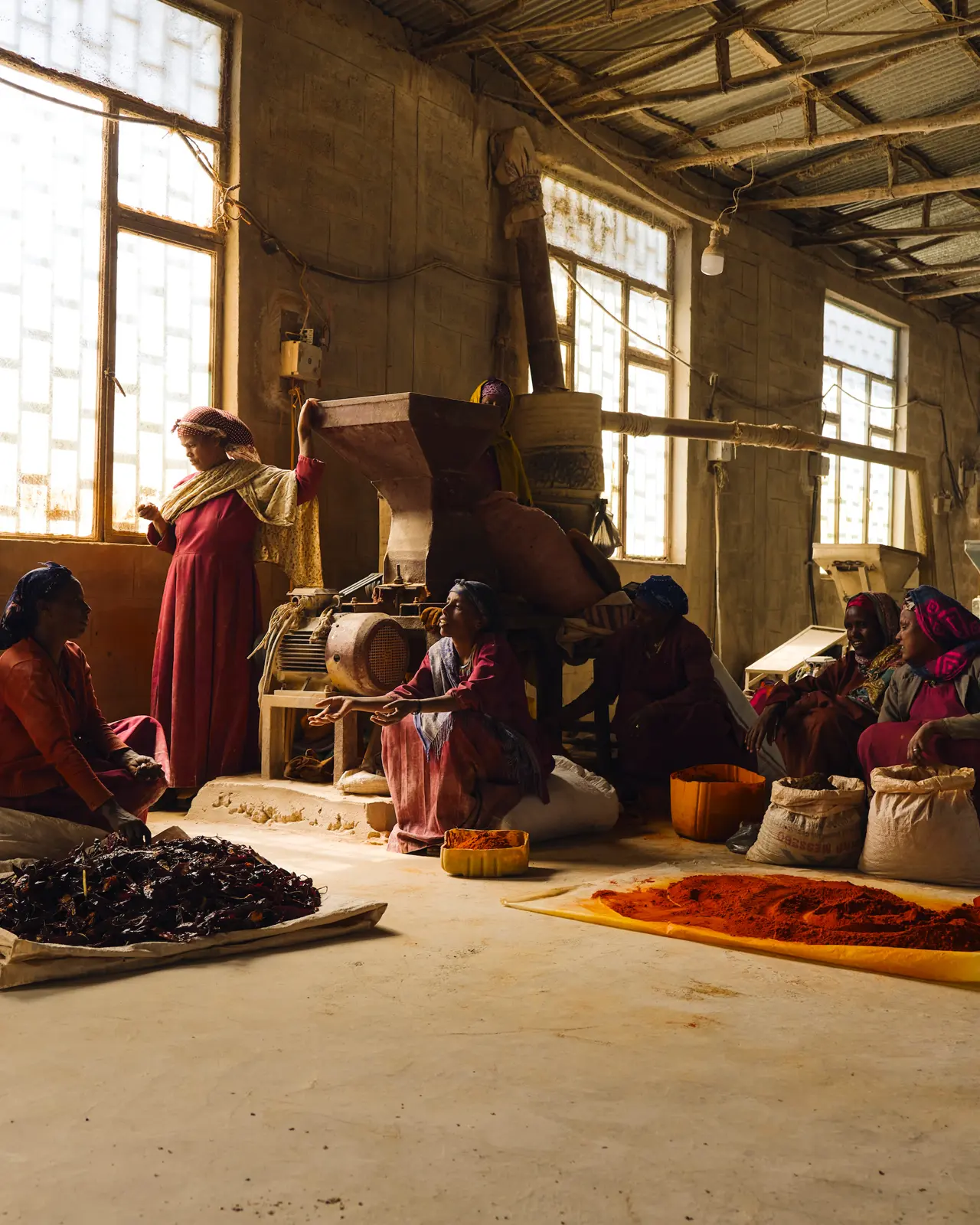 Work carried out by women at a managed spice mill in Ethiopia