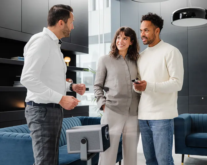 Couple receiving consultation on Cine Play 1 at Leica Store