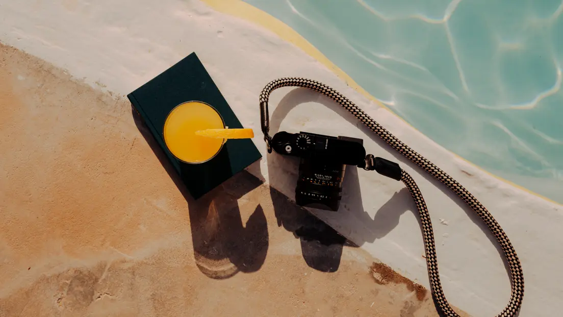 Leica Q camera photographed from above by the pool