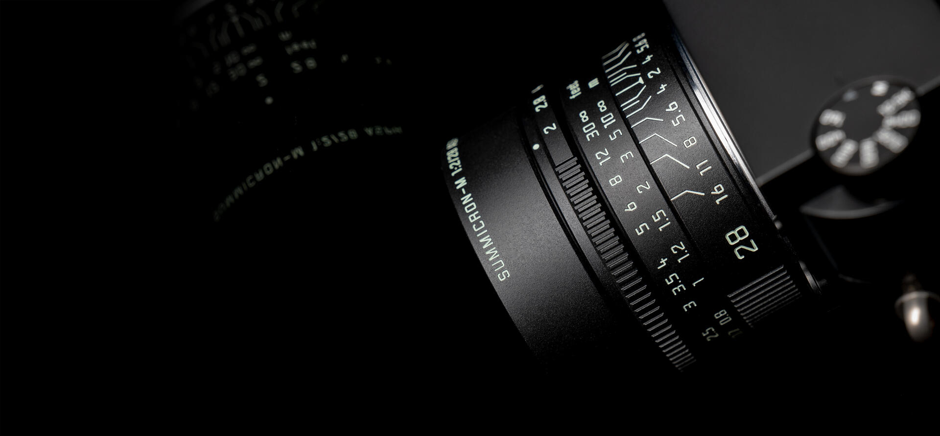 Summicron-M_28_matte_black_paint_Teaser_3840x1780px