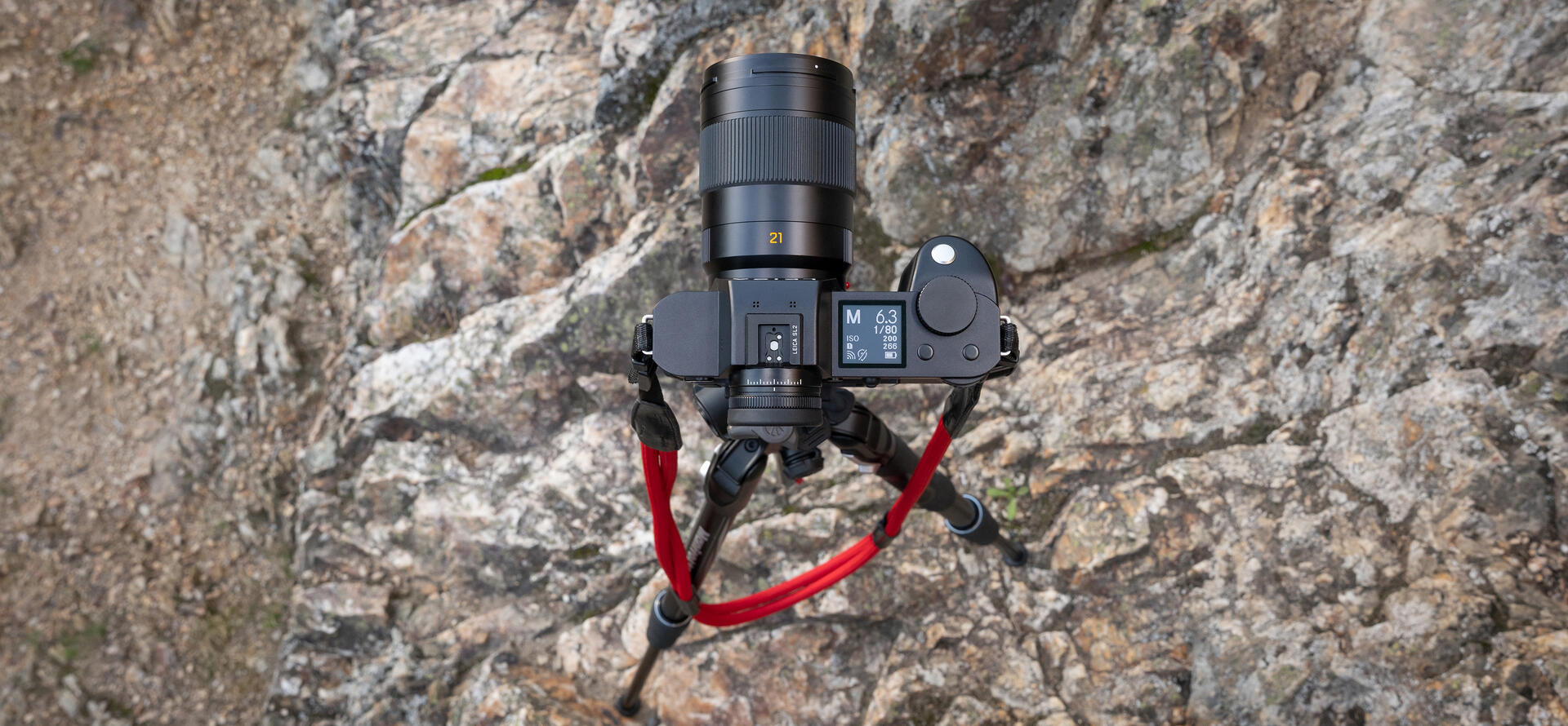Leica Super-APO-Summicron-SL 21 f/2 ASPH. on a Leica SL2 standing on rocks.