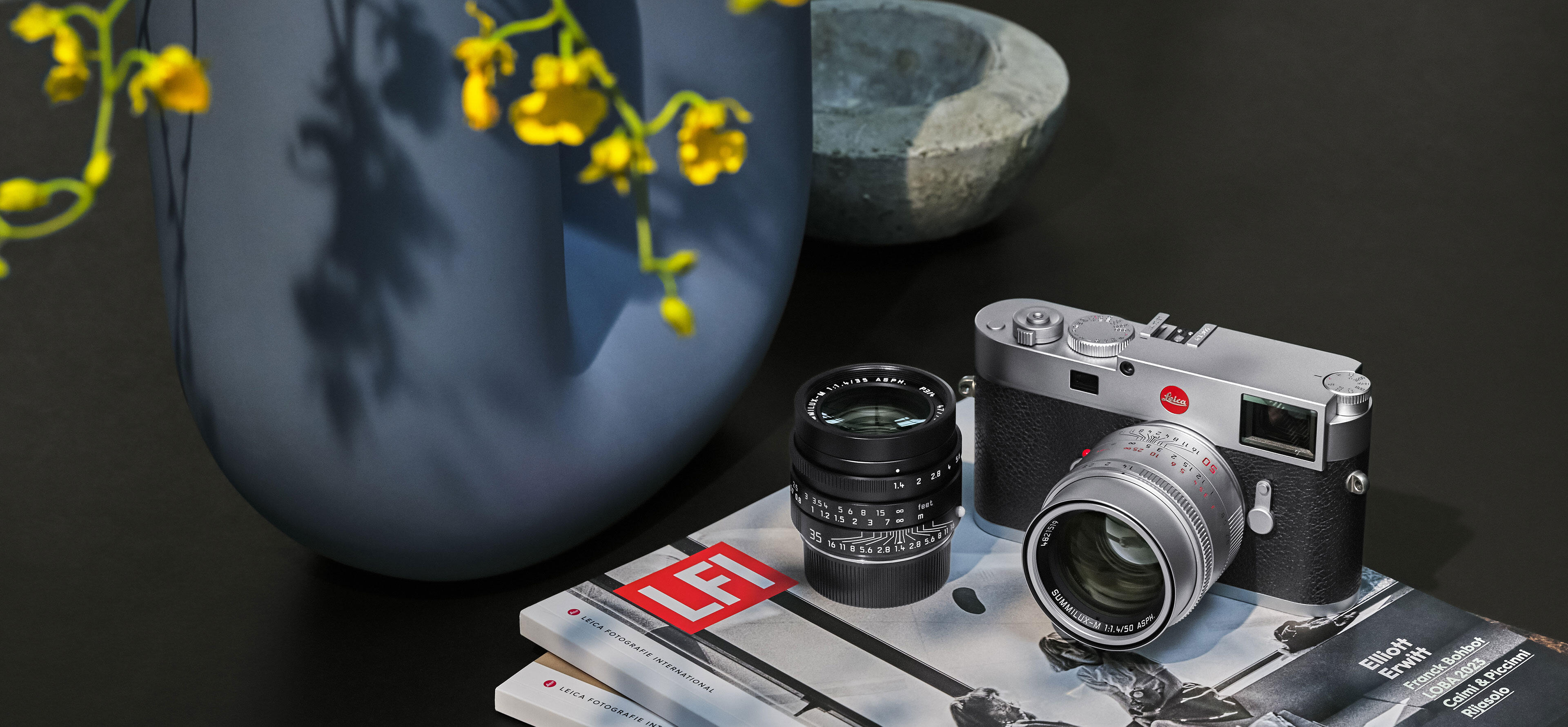 Leica M 11 silver with lens and LFI Brochure