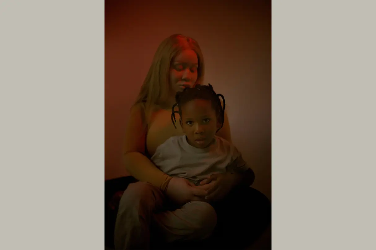 Mother with child on her lap