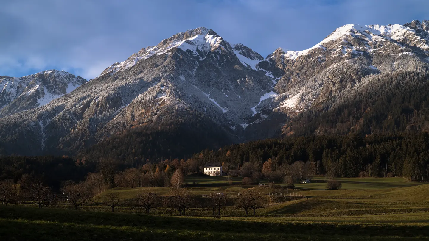Mountain panorama with white peaks and blue sky