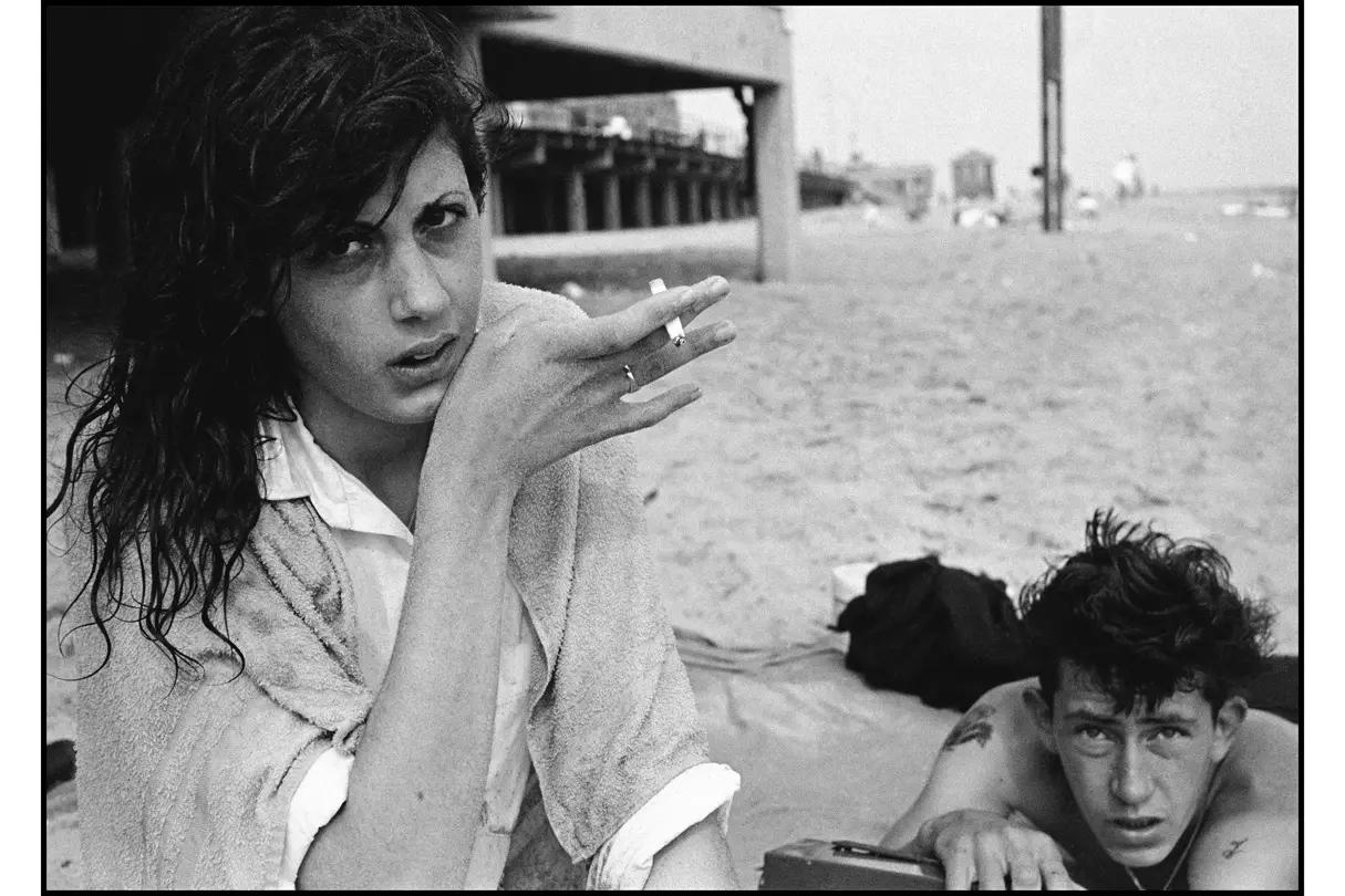 a woman and a man at the beach