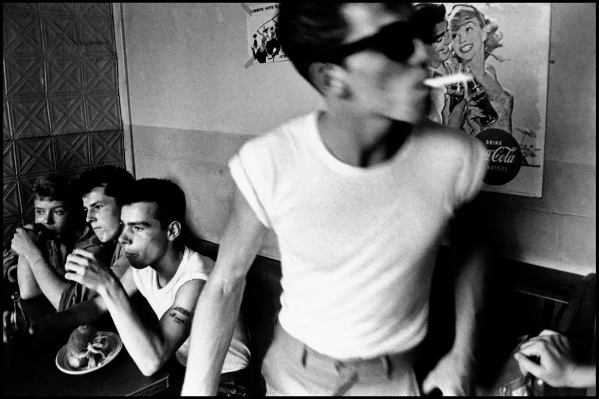 smoking teenager in a group