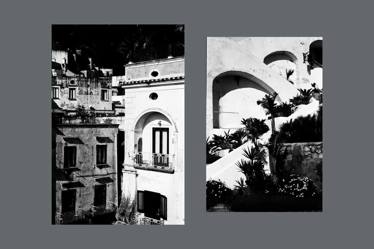 Buildings inside a town in black and white.