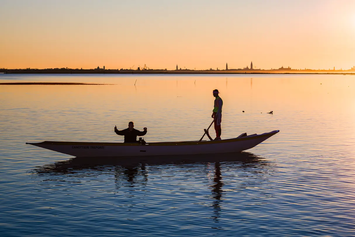 a boat with people in a body of water