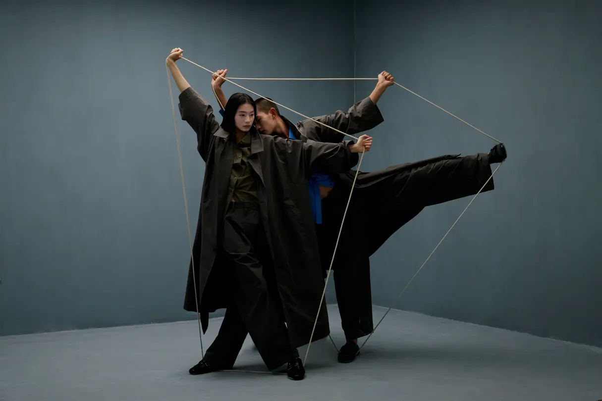 Woman and man dancing with a rope