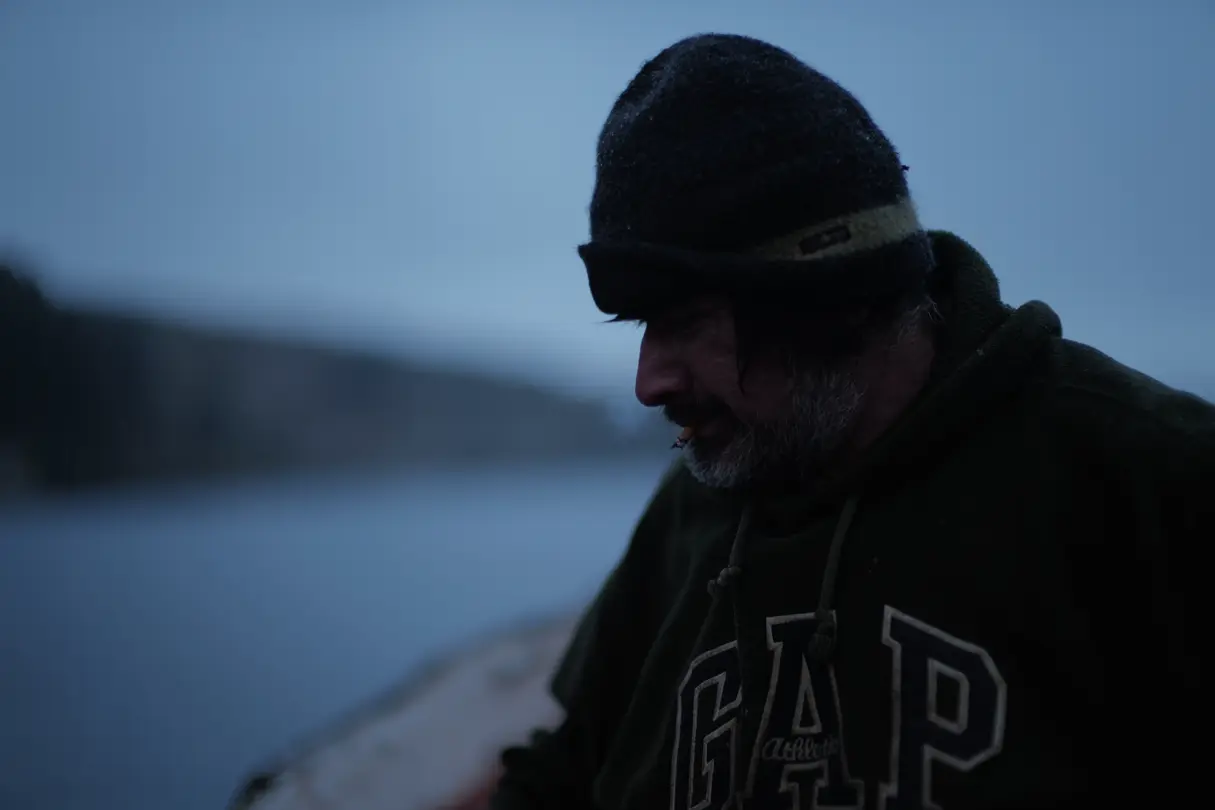 old man with cigarette in his mouth