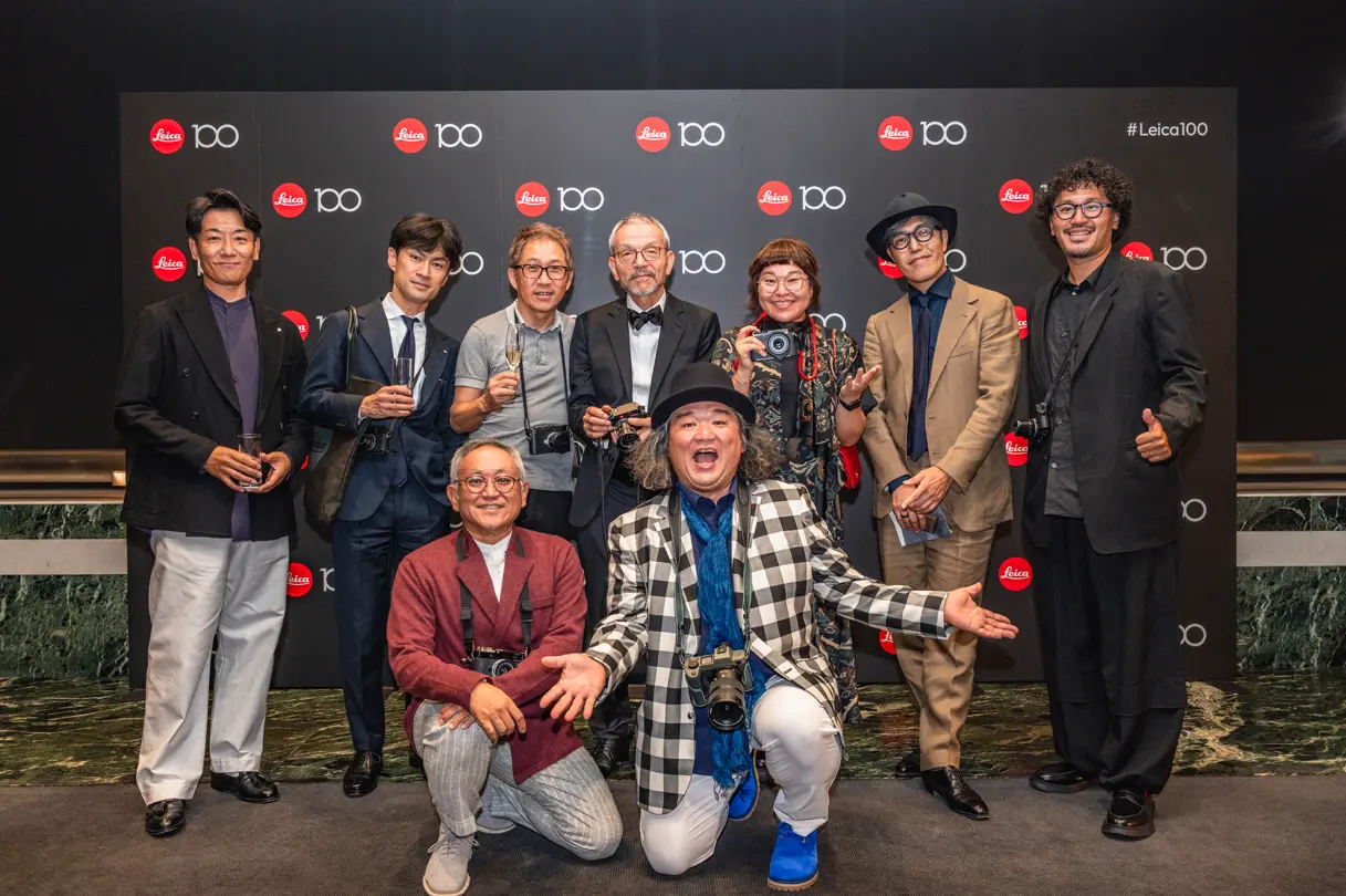 100 Years of Leica in Tokyo people infront the photowall