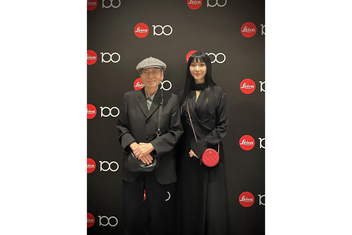 100 Years of Leica in Tokyo people infront the photowall
