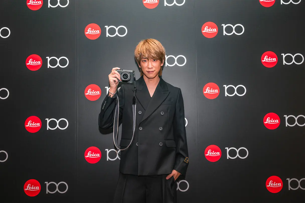 100 Years of Leica in Tokyo people infront the photowall