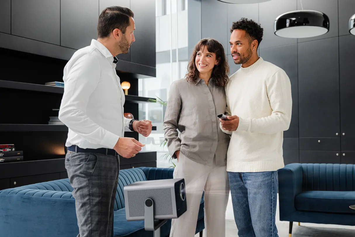 Couple receiving consultation on Cine Play 1 at Leica Store