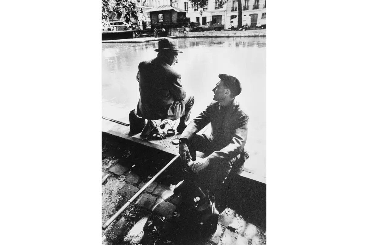 2 Men sitting at a River 