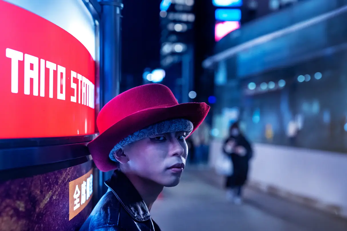 Woman with a big red hat