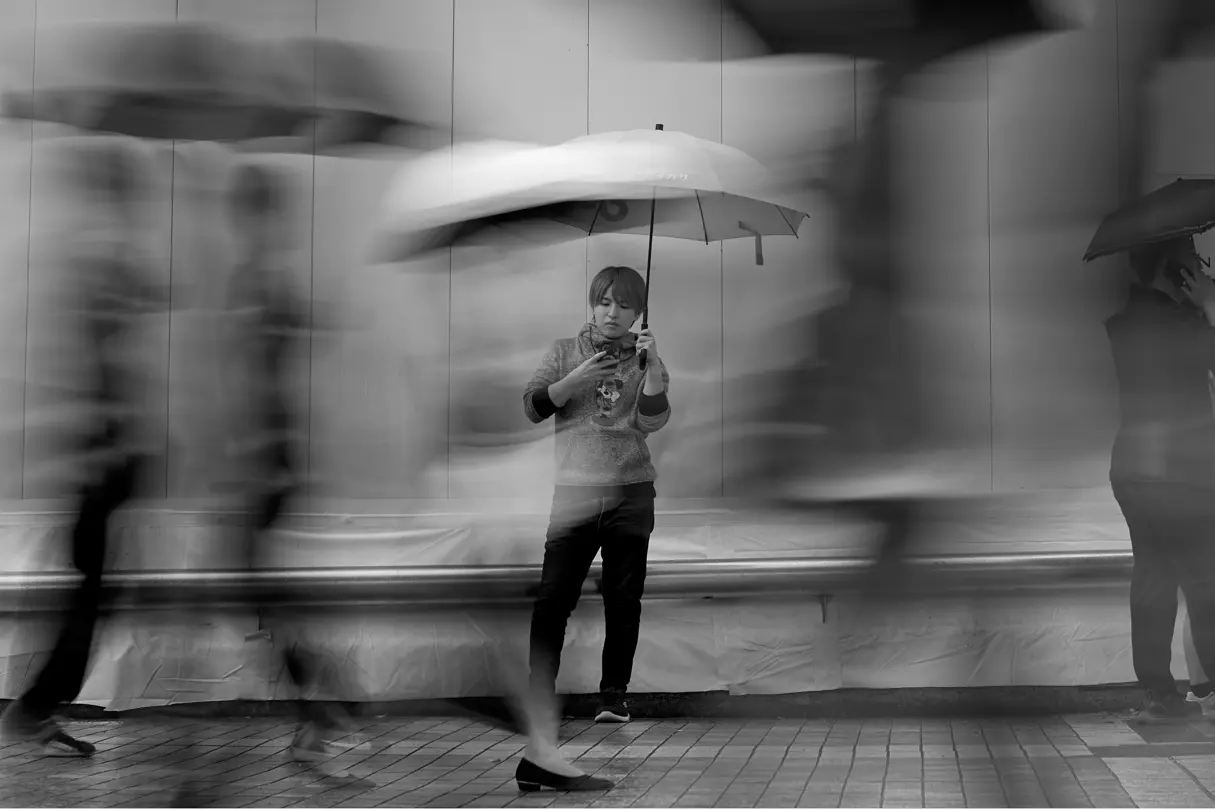 Man with an umbrella black and white photography