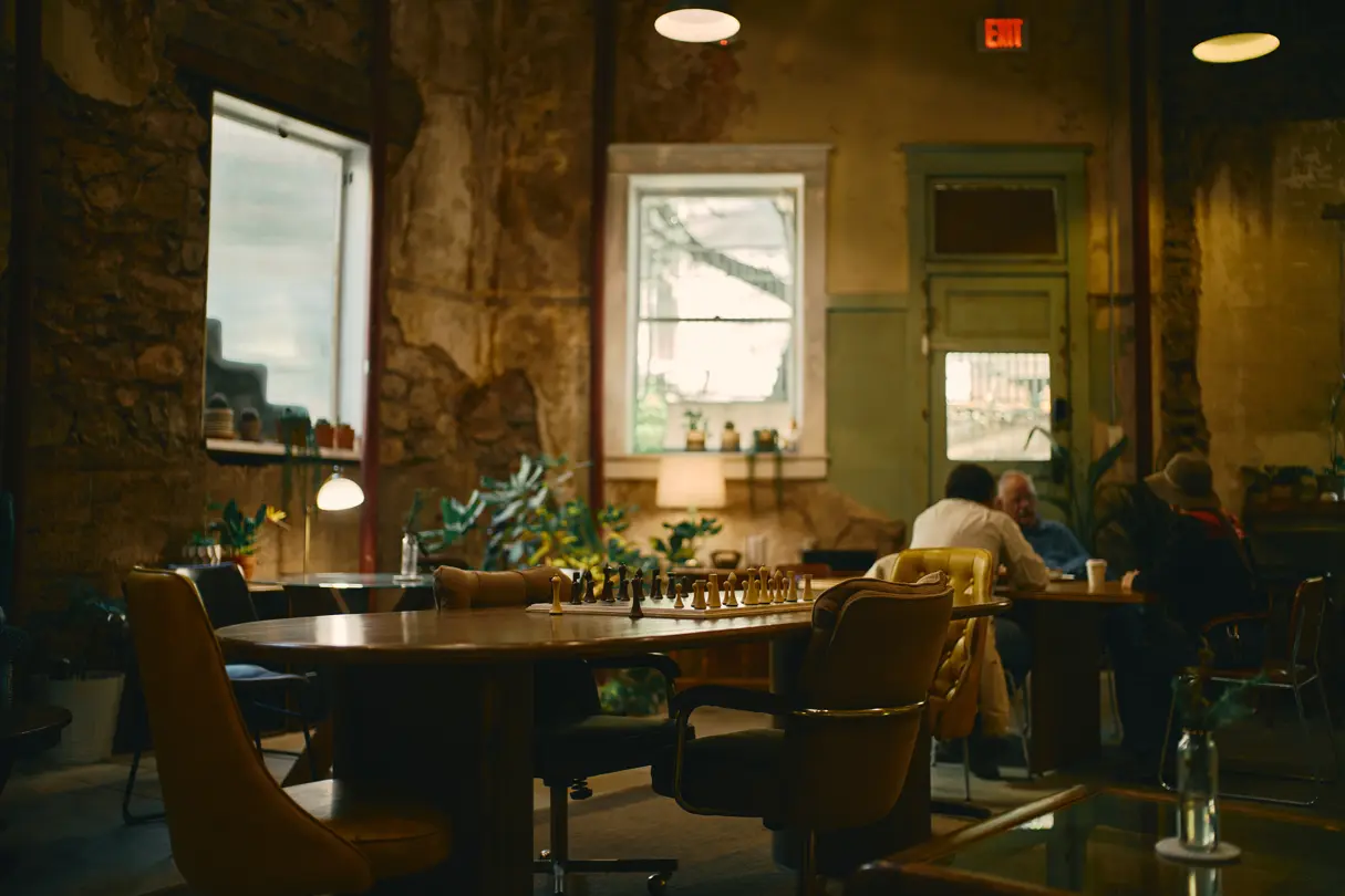 Chessboard on a table in a room