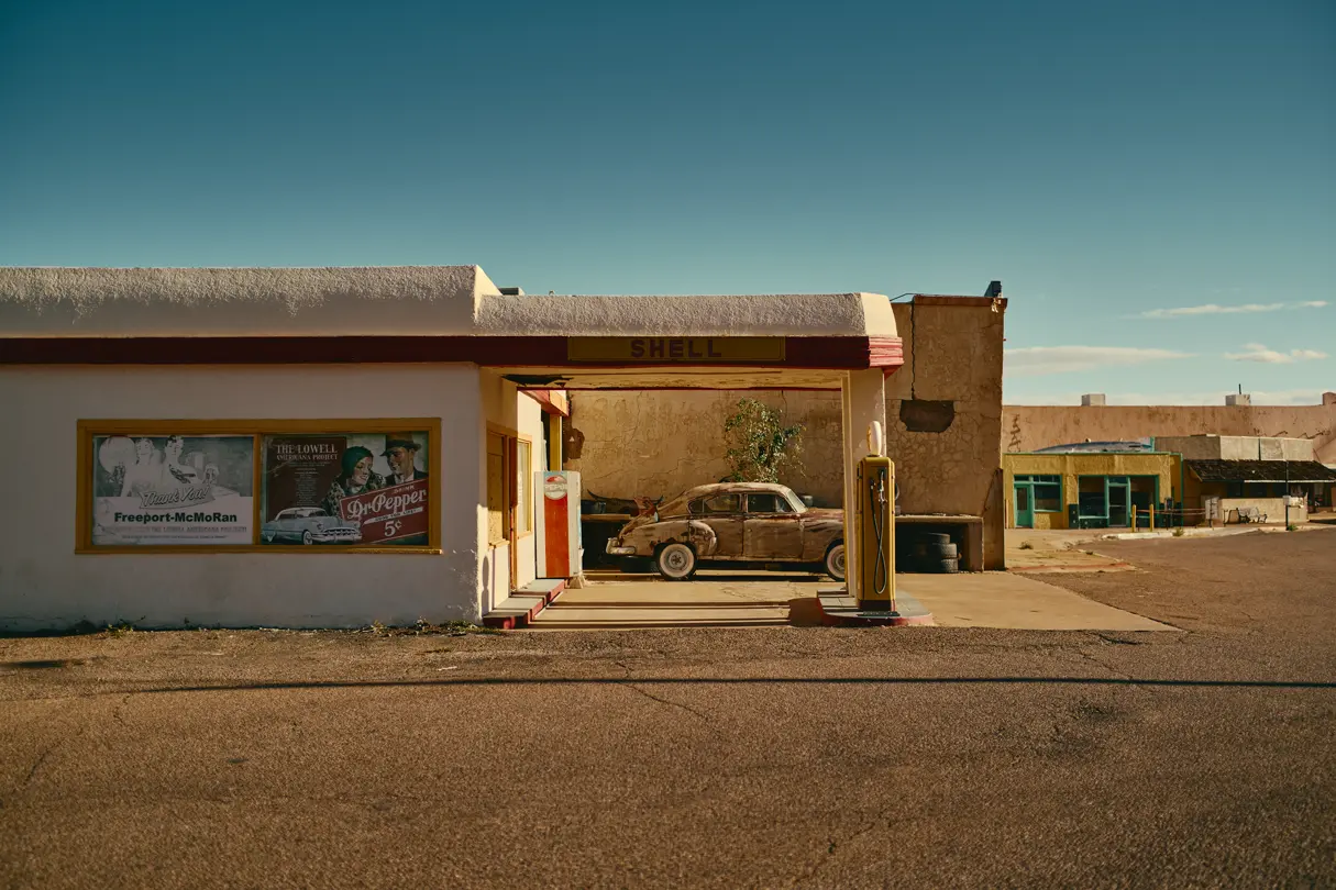Old abandoned petrol station with old car