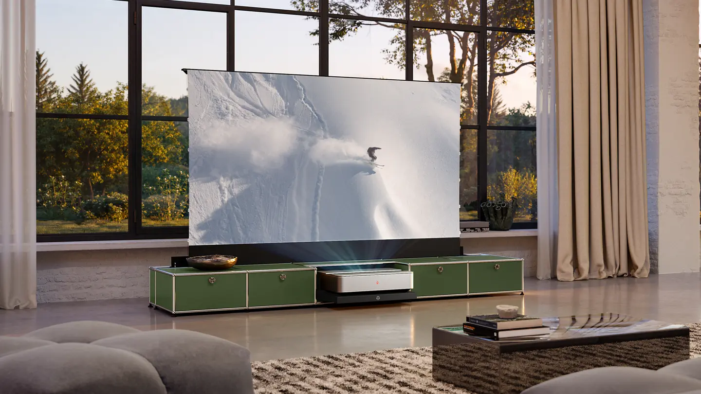 Leica Cine 1 projection showing a skier heading down the mountain.