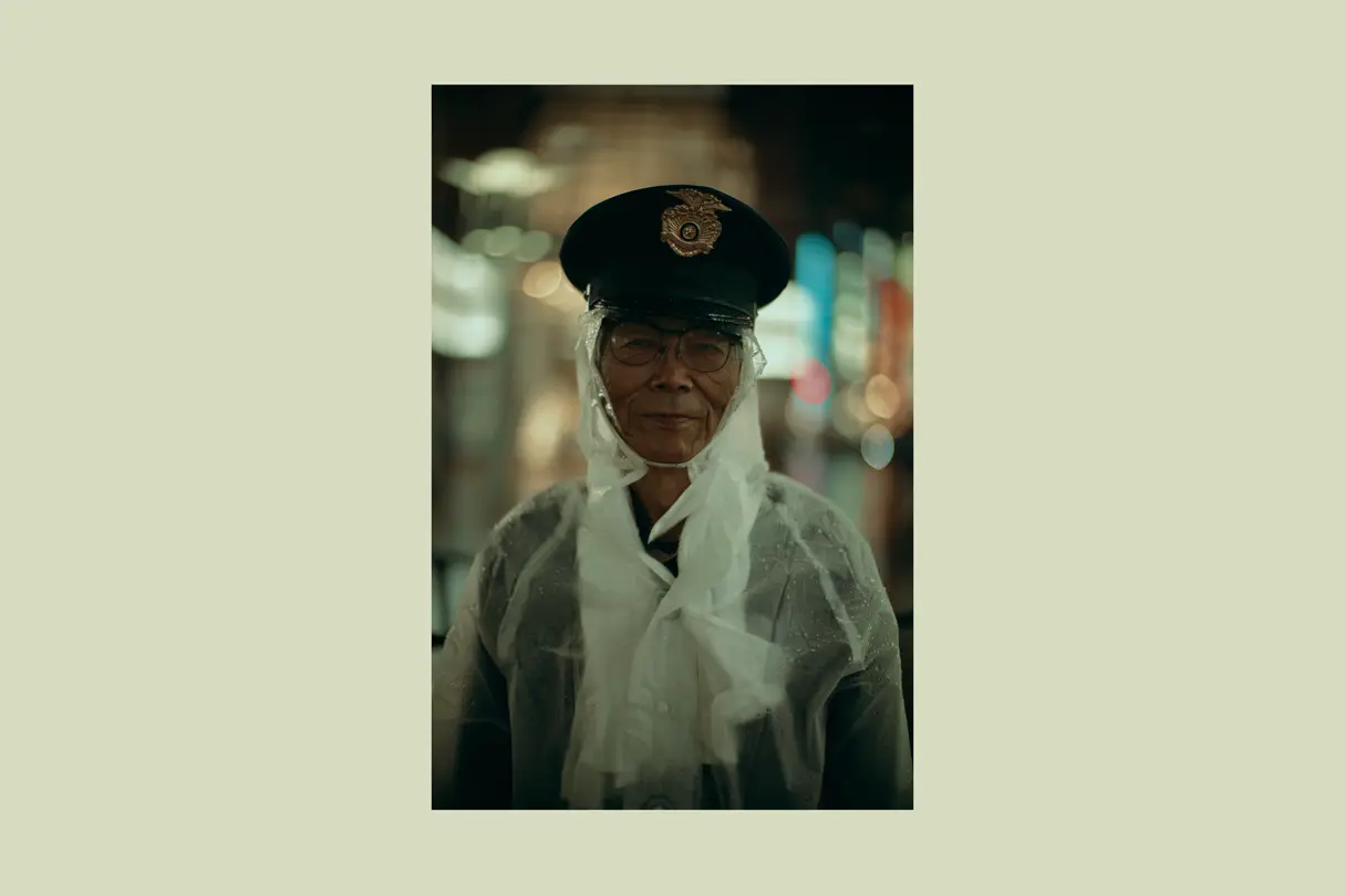 Man with raincoat in Tokyo