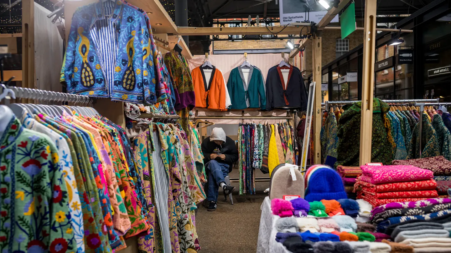 Colour street photograph of market vendor