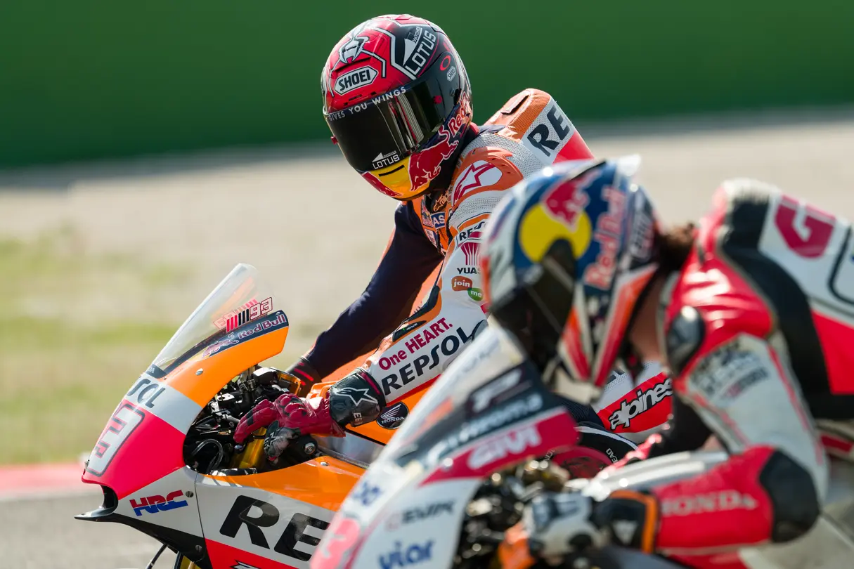 Two Moto GP drivers on their bikes