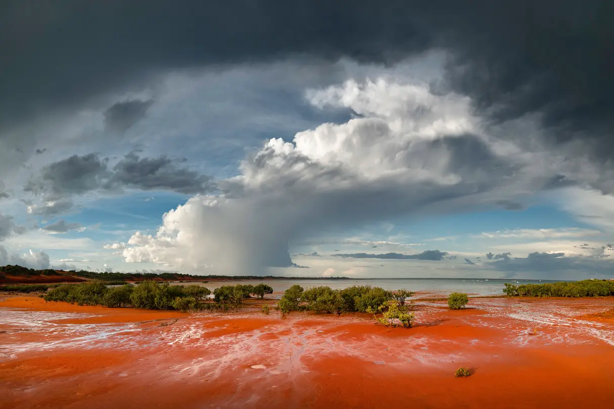 Red sand by the sea