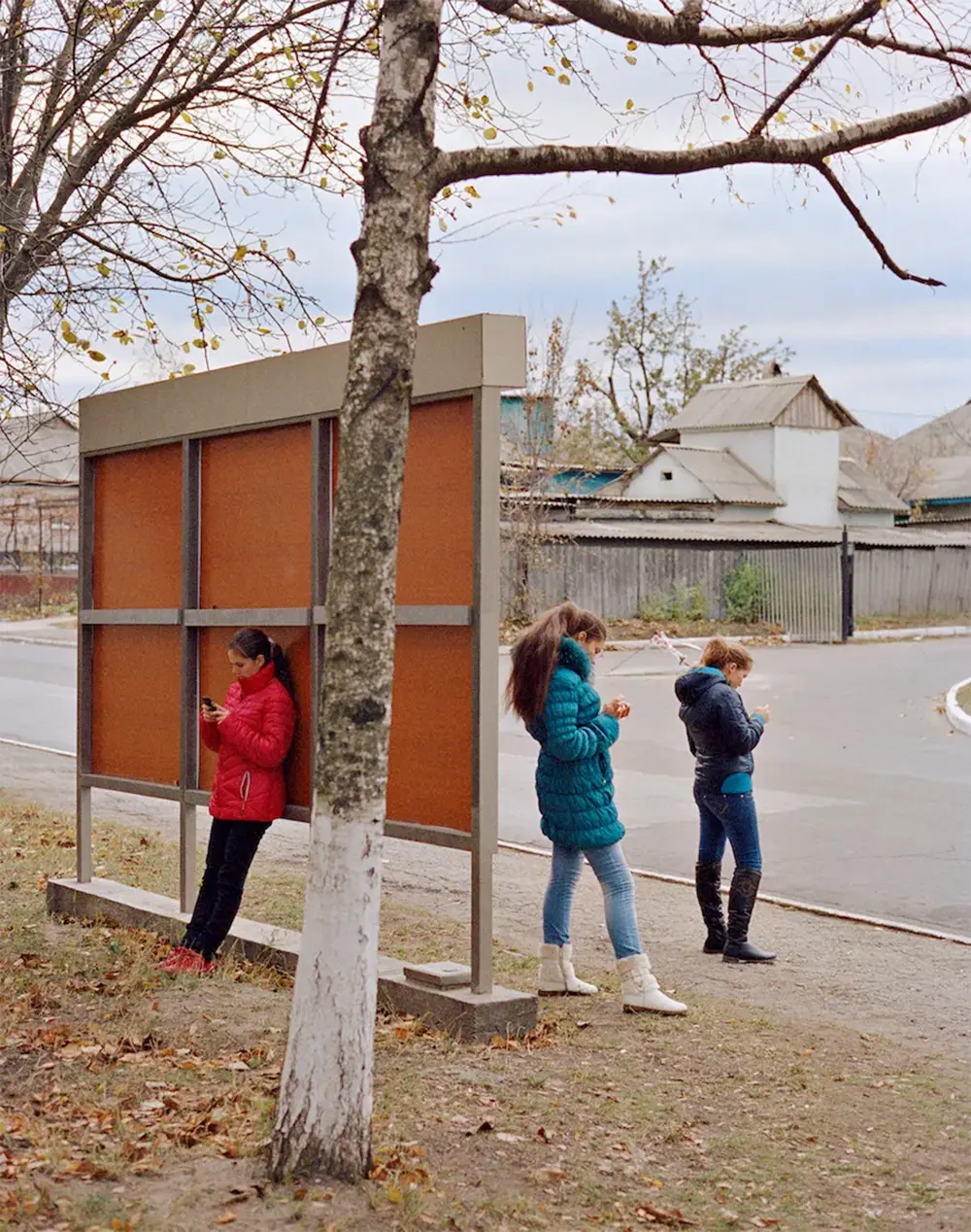 people standing with sign