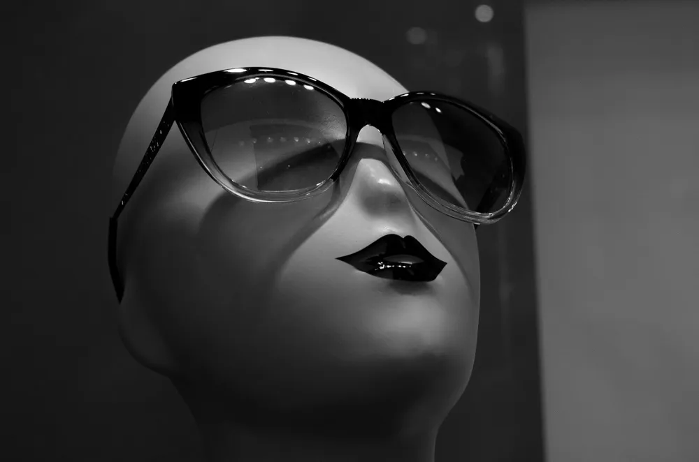 doll with glasses b&w