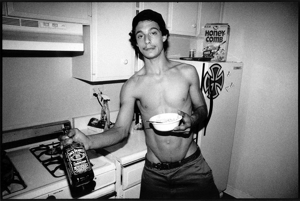 teenager with alcohol b&w