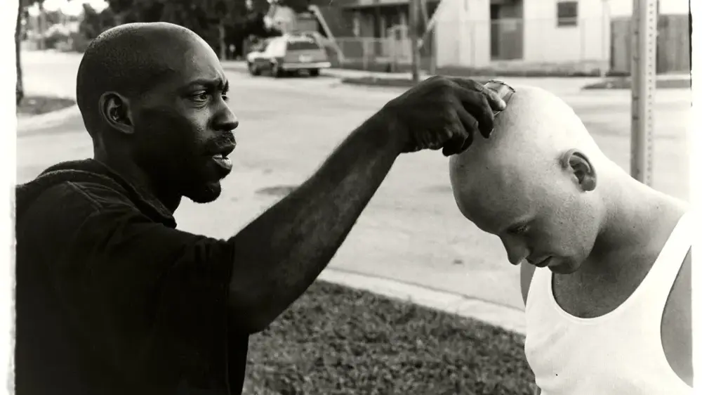 two man interacting b&w