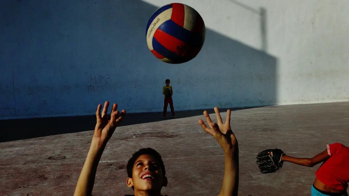 kid playing handball