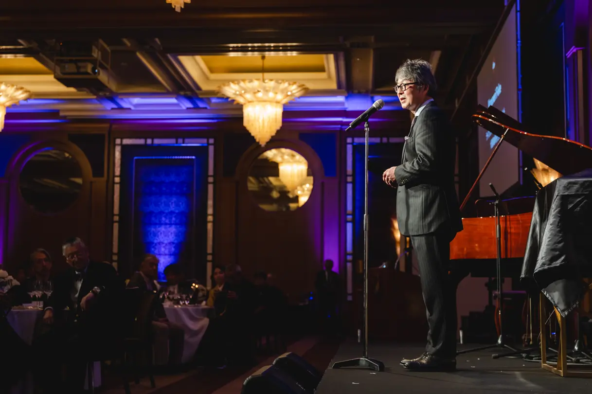 Mr. Fuke, President of Leica Camera Japan, on stage at the Ginza anniversary dinner