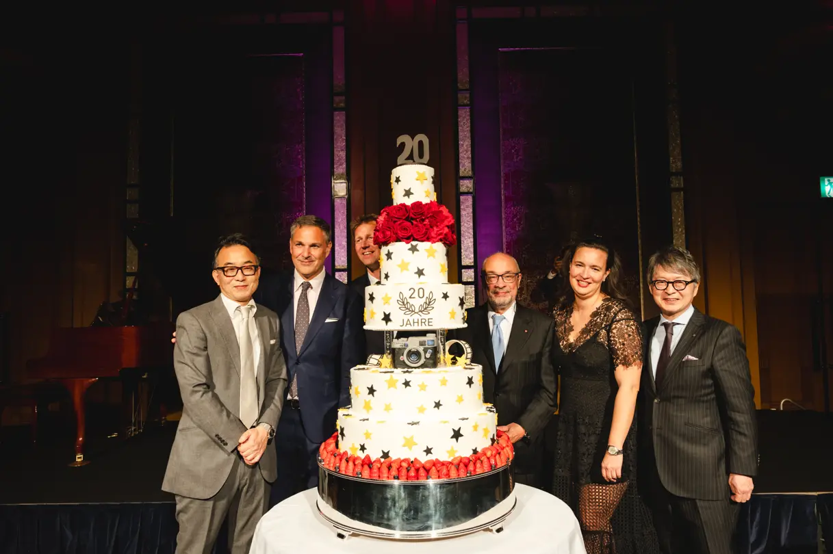 At the Leica Ginza Store Anniversary Dinner, anniversary cake celebration scene