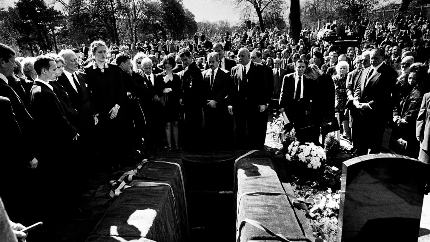 Black and white photograph of a funeral procession