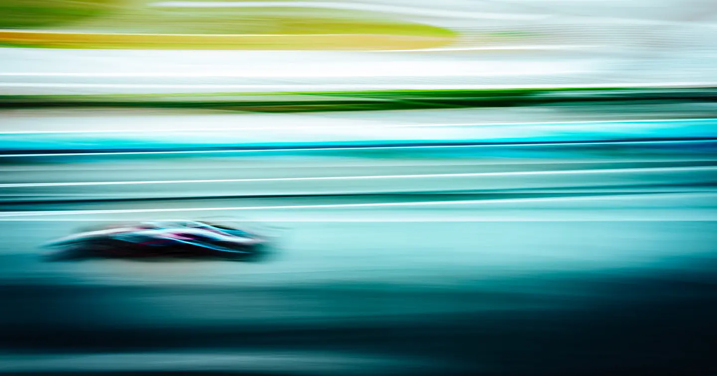 A blurred photograph caused by the speed of a Formula 1 car