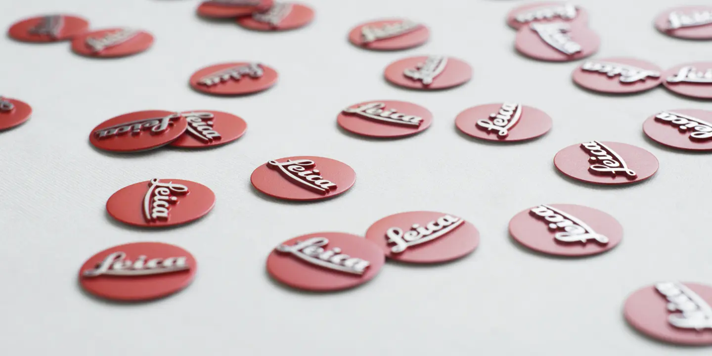 Buttons labeled Leica are distributed on a white background.